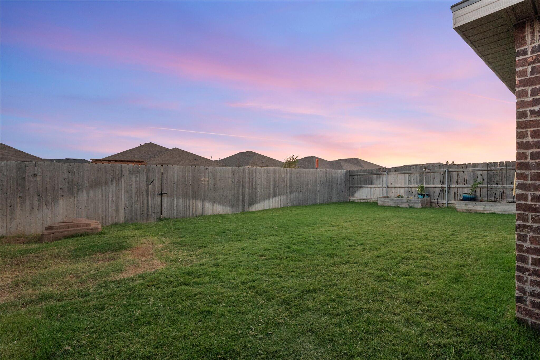 7449 31st Street Lubbock, TX 79407 - Photo 21 of 23 a view of a backyard
