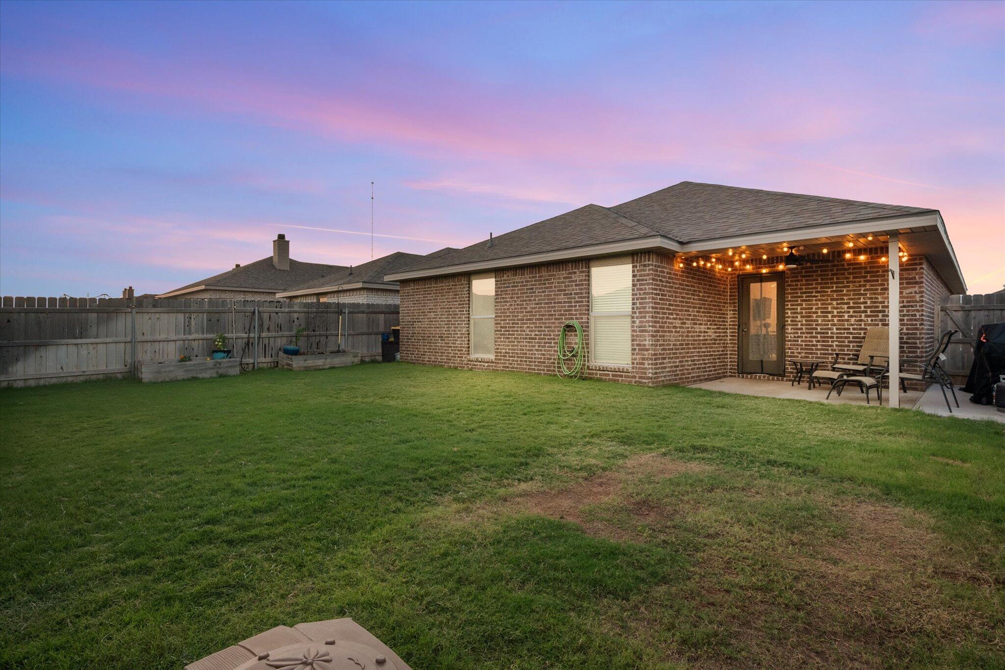 7449 31st Street Lubbock, TX 79407 - Photo 22 of 23 a view of a house with a big yard