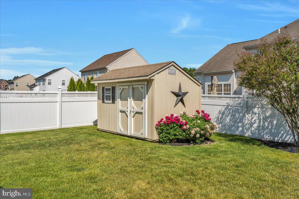 74 Candlewood Road Williamstown, NJ 08094 - Photo 36 of 45 Charming shed in a vibrant backyard.
