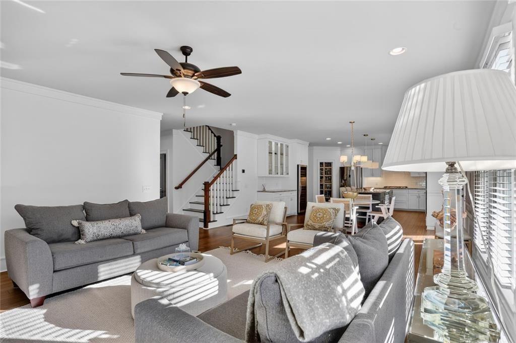 1311 Conway Road Decatur, GA 30030 - Photo 16 of 49 a living room with furniture a couch and a chandelier