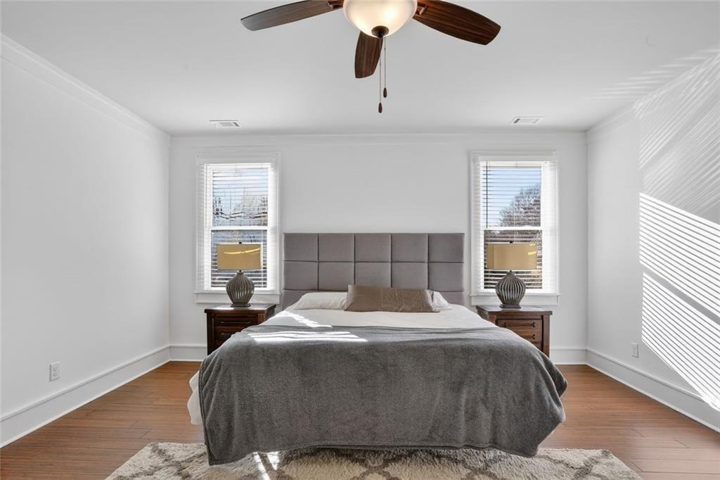 1311 Conway Road Decatur, GA 30030 - Photo 27 of 49 a bedroom with a large bed and a window