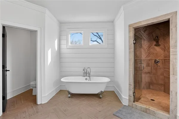 a bathroom with a sink and a shower