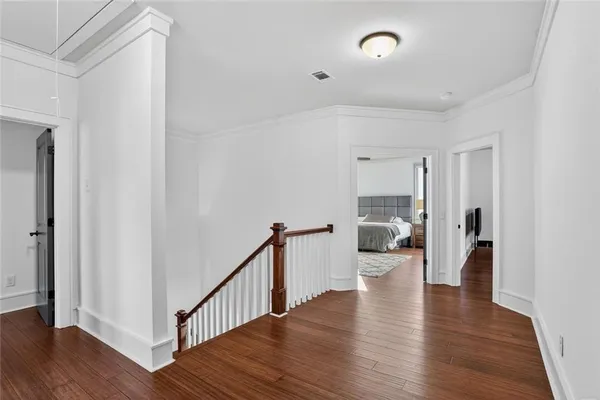 a view of a livingroom with wooden floor