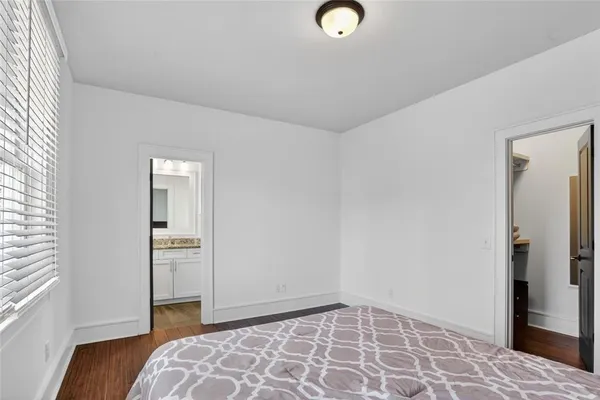 a view of room with window and bathroom