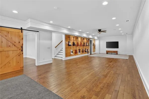 a view of a livingroom with an empty space and a fireplace