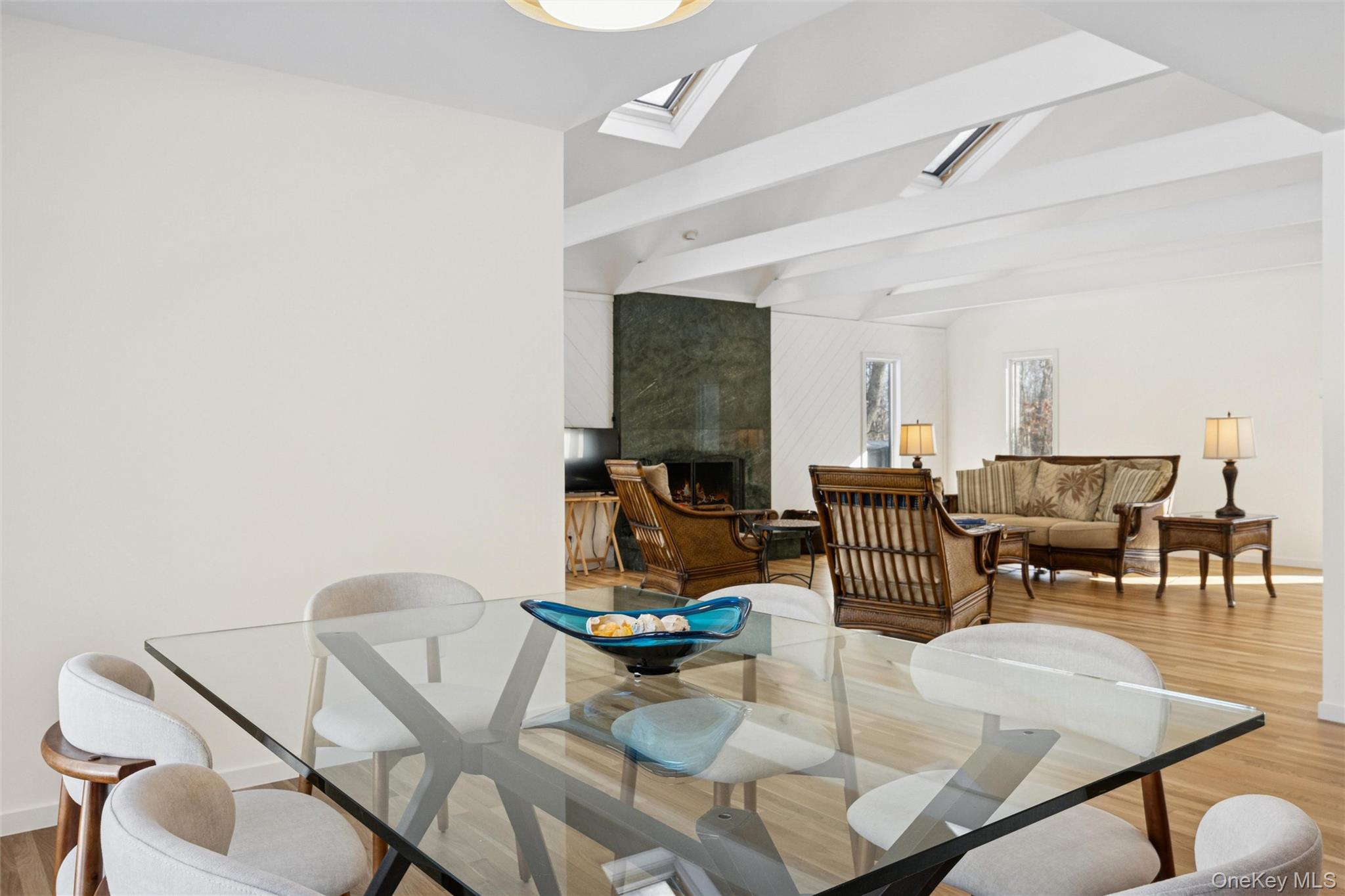 15 Rivers Road East Hampton, NY 11937 - Photo 11 of 33 a living room with furniture a dining table and chairs with rug