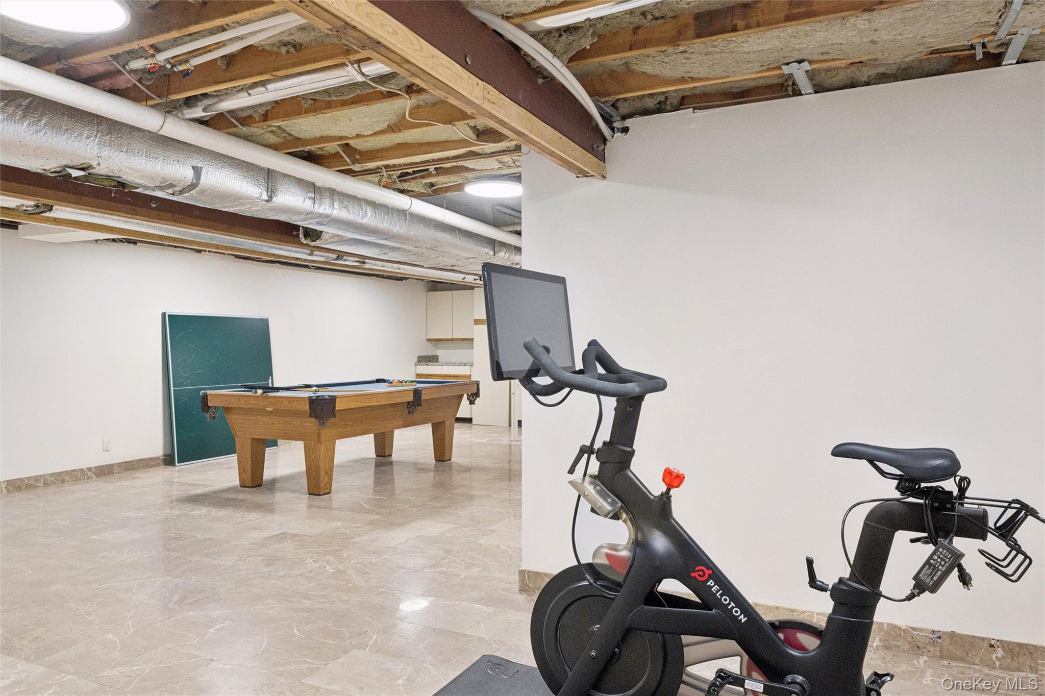 15 Rivers Road East Hampton, NY 11937 - Photo 28 of 33 a view of a room with gym equipment