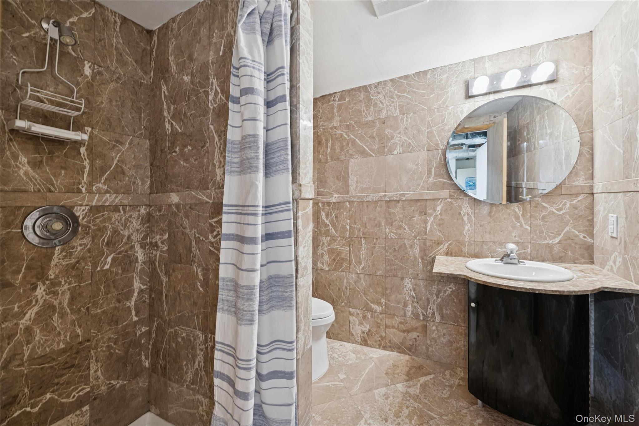 15 Rivers Road East Hampton, NY 11937 - Photo 29 of 33 a bathroom with a sink and mirror