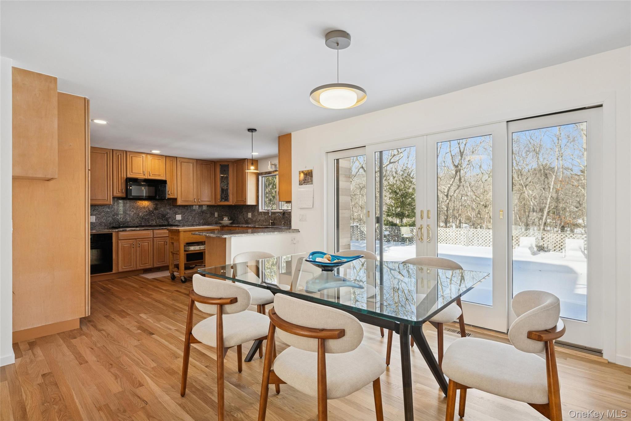15 Rivers Road East Hampton, NY 11937 - Photo 4 of 33 a view of a dining room with furniture window and outside view