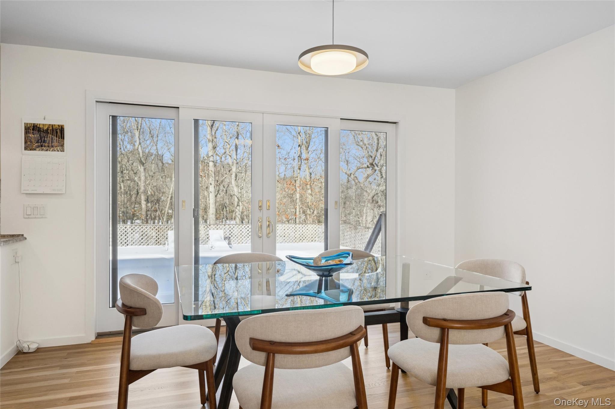 15 Rivers Road East Hampton, NY 11937 - Photo 7 of 33 a view of a room with a table and chairs