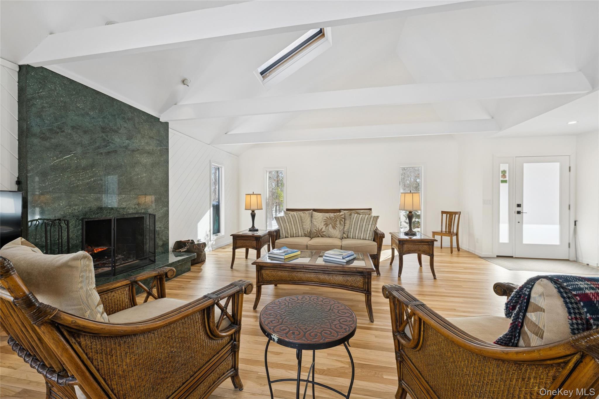 15 Rivers Road East Hampton, NY 11937 - Photo 8 of 33 a living room with furniture and a fireplace