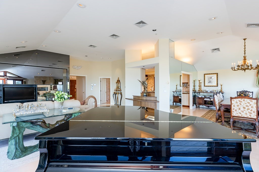 131 Nichols Road, Unit 8 Cohasset, MA 02025 - Photo 12 of 37 a room with furniture and flat screen tv