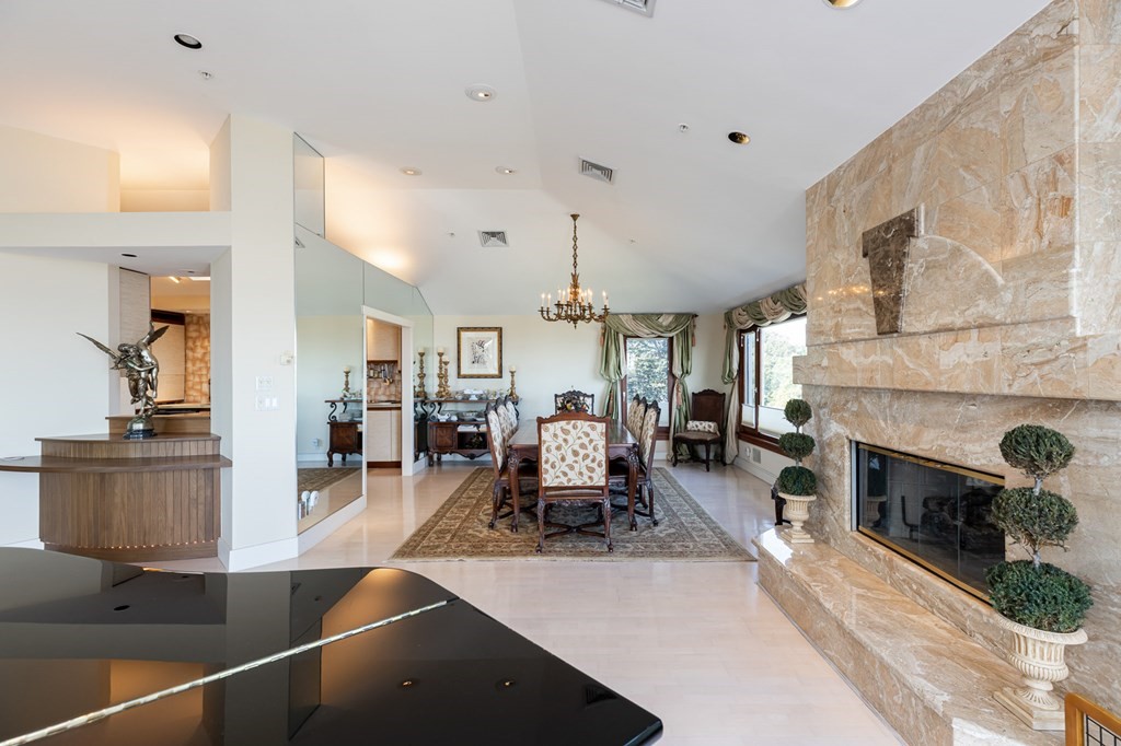 131 Nichols Road, Unit 8 Cohasset, MA 02025 - Photo 13 of 37 a living room with furniture and a fireplace