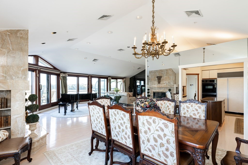 131 Nichols Road, Unit 8 Cohasset, MA 02025 - Photo 14 of 37 a view of a dining room with furniture window and wooden floor