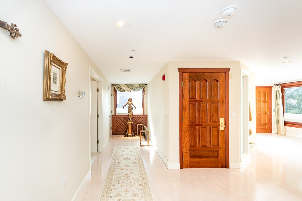 131 Nichols Road, Unit 8 Cohasset, MA 02025 - Photo 25 of 37 a very nice looking room with a large window