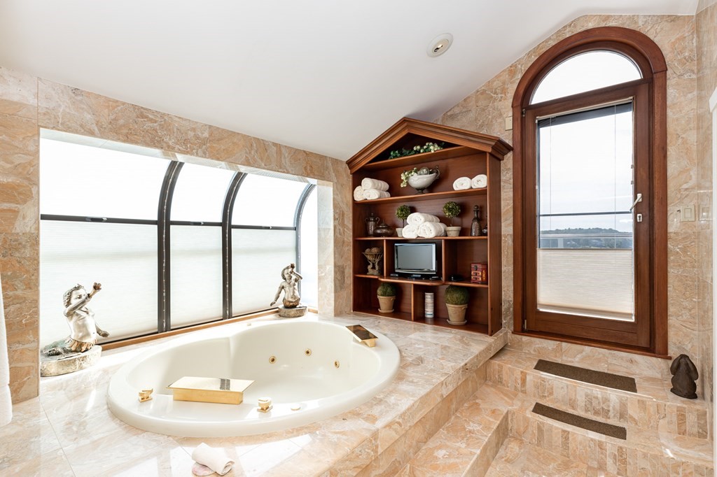 131 Nichols Road, Unit 8 Cohasset, MA 02025 - Photo 33 of 37 a view of fireplace and window