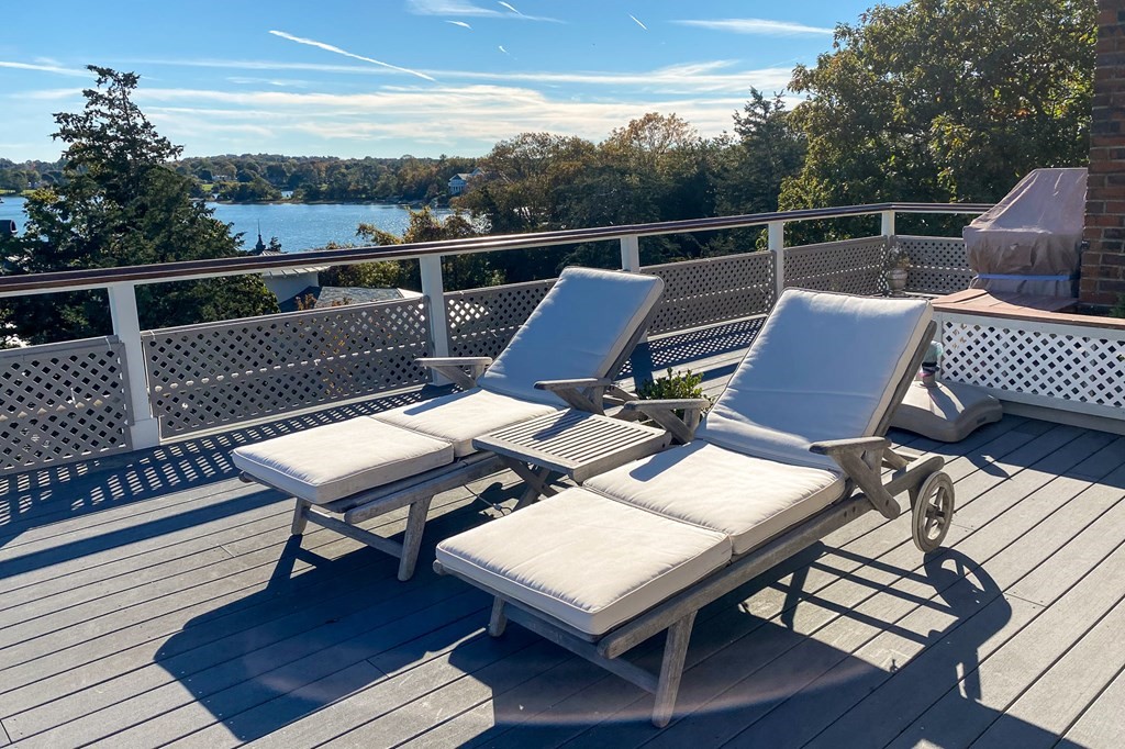 131 Nichols Road, Unit 8 Cohasset, MA 02025 - Photo 37 of 37 a view of a terrace with furniture