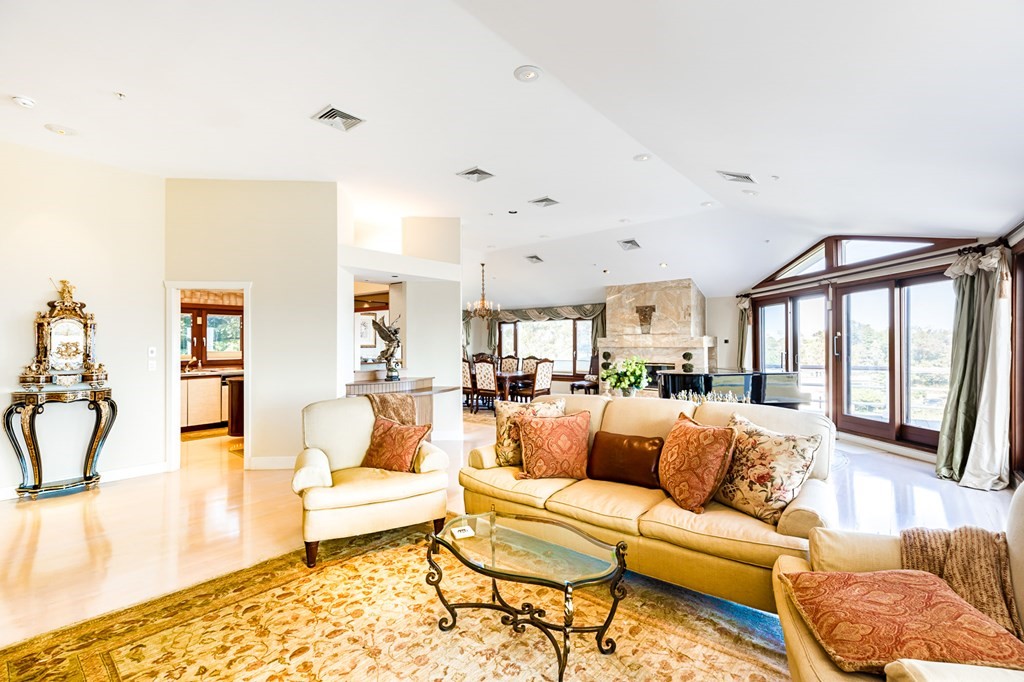 131 Nichols Road, Unit 8 Cohasset, MA 02025 - Photo 5 of 37 a living room with furniture and a large window