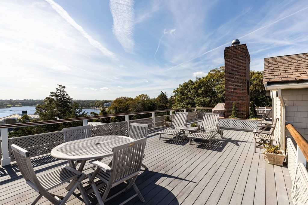 131 Nichols Road, Unit 8 Cohasset, MA 02025 - Photo 6 of 37 a terrace of a house with outdoor seating