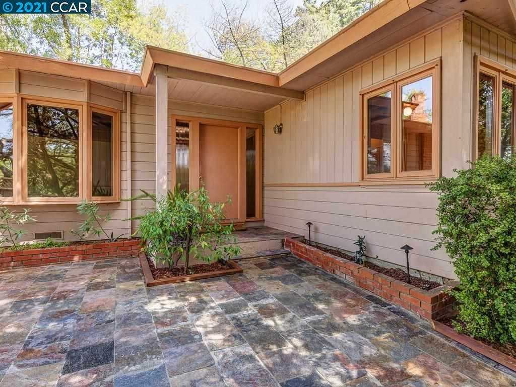 919 Janet Lane Lafayette, CA 94549 - Photo 2 of 31 a front view of a house with a yard