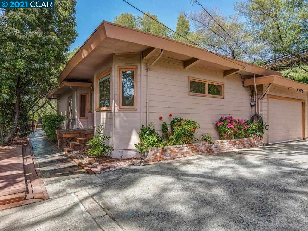 919 Janet Lane Lafayette, CA 94549 - Photo 26 of 31 a front view of a house with a yard