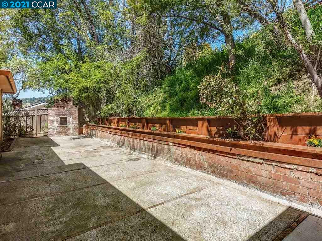 919 Janet Lane Lafayette, CA 94549 - Photo 28 of 31 a view of a tennis court with trees in the background