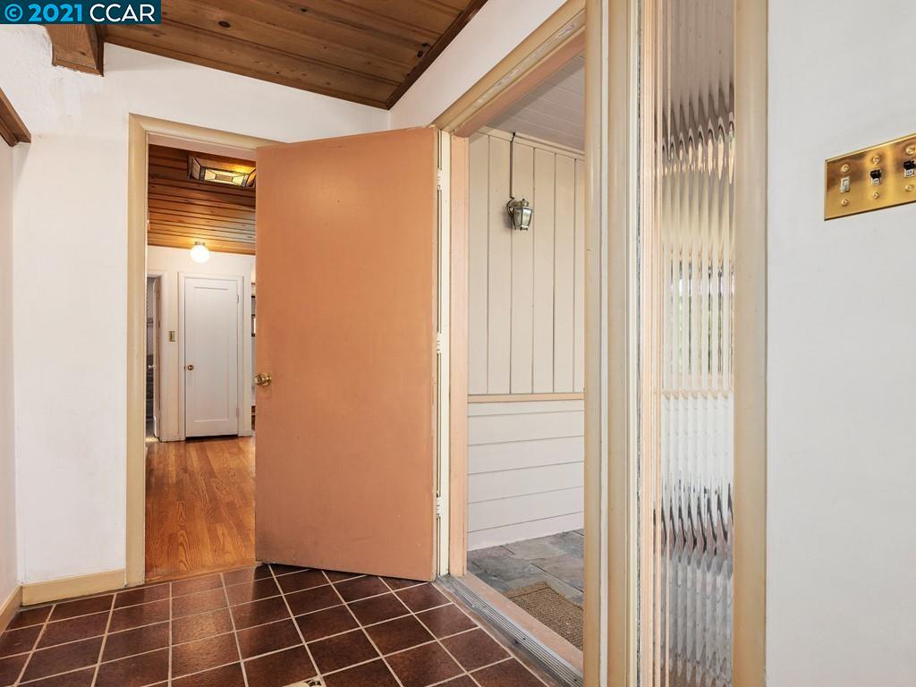 919 Janet Lane Lafayette, CA 94549 - Photo 8 of 31 a view of a hallway with wooden door