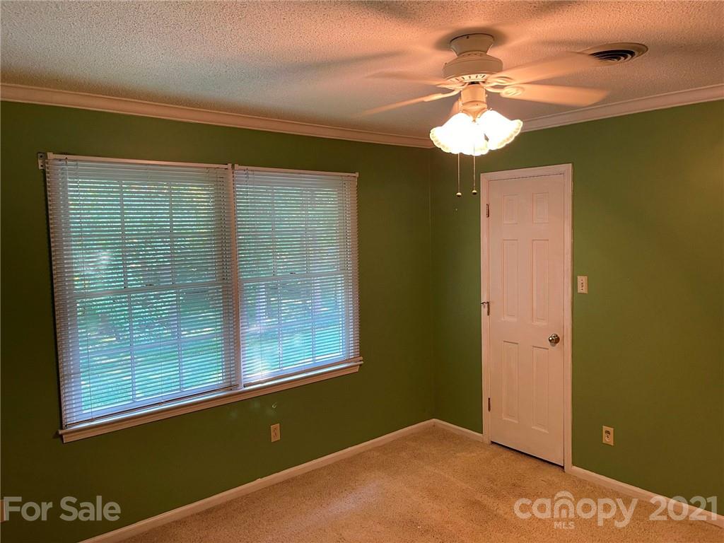 170 Nottingham Road Salisbury, NC 28147 - Photo 22 of 27 a view of a room that has a window and a ceiling fan