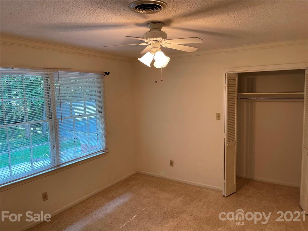 170 Nottingham Road Salisbury, NC 28147 - Photo 23 of 27 a view of a livingroom with a ceiling fan and window