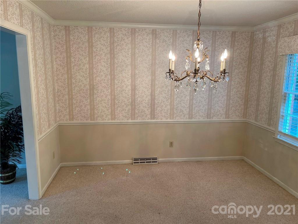 170 Nottingham Road Salisbury, NC 28147 - Photo 5 of 27 a view of a room with window and chandelier fan
