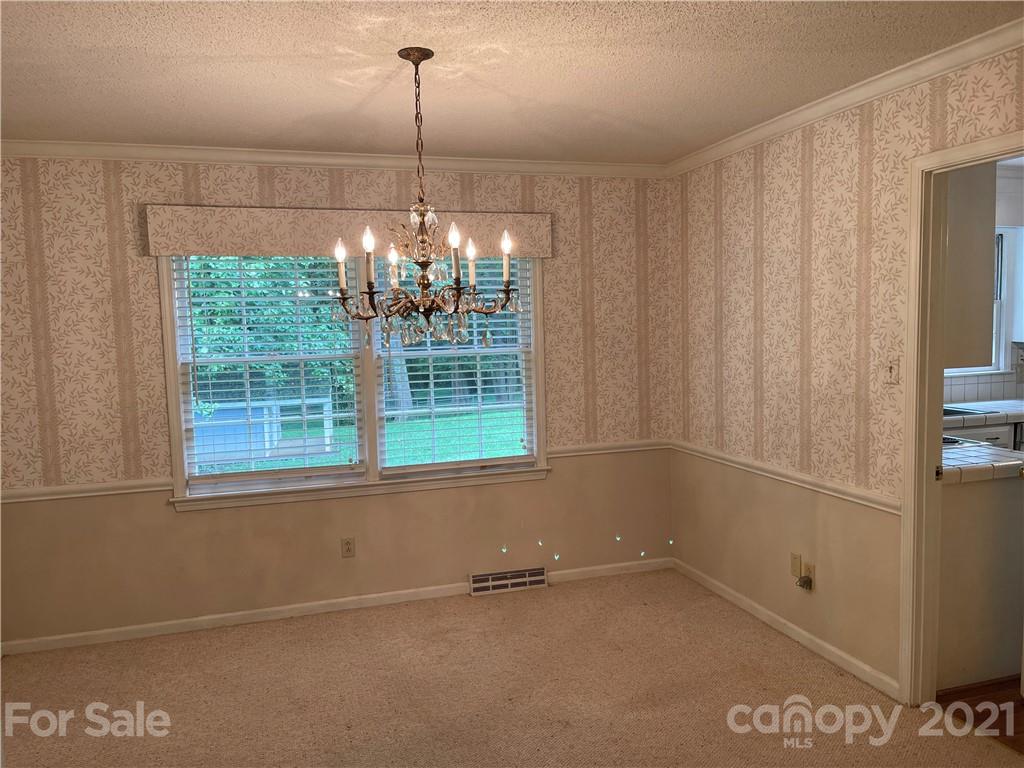170 Nottingham Road Salisbury, NC 28147 - Photo 6 of 27 a room with window and a chandelier