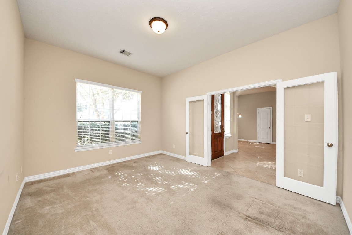 25006 Florina Ranch Drive Katy, TX 77494 - Photo 4 of 48 Home office/den with french doors located at the front of the house