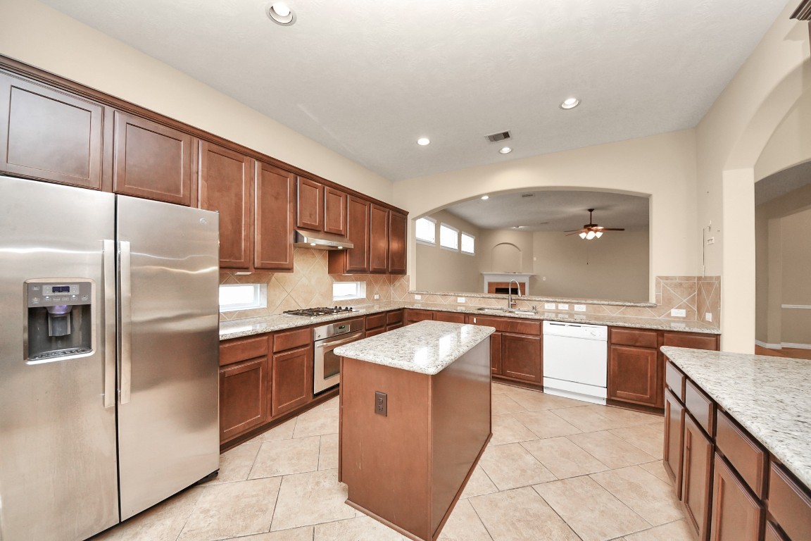 25006 Florina Ranch Drive Katy, TX 77494 - Photo 5 of 48 Island kitchen with plenty of storage space