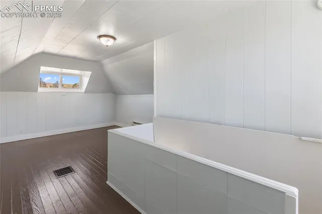 a view of small space with table and chair