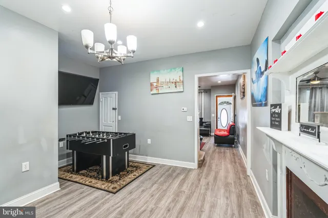 a view of livingroom with furniture and wooden floor