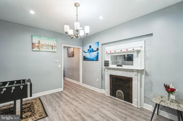 a view of a room with furniture and a window