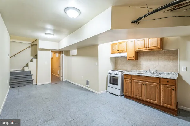 a view of bedroom with wooden floor