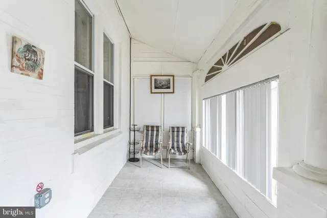 a view of a bedroom from a hallway