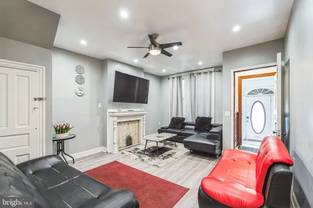 a bedroom with furniture and a chandelier