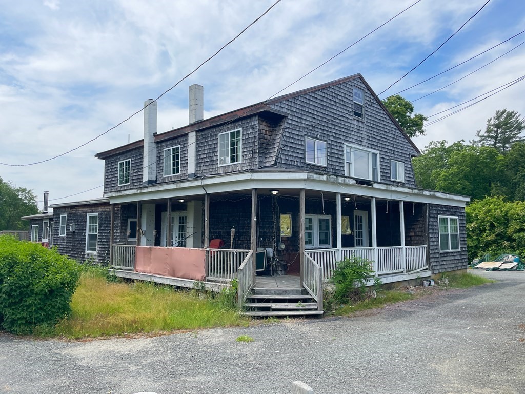 47 County Road East Freetown, MA 02717 - Photo 1 of 17 a front view of a house with garden