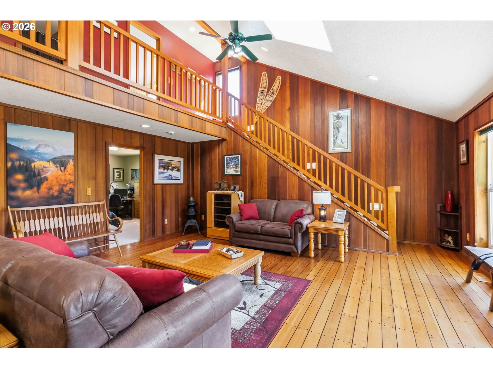 359 Frank Smith Road Toutle, WA 98649 - Photo 13 of 44 a living room with furniture a rug and a floor to ceiling window