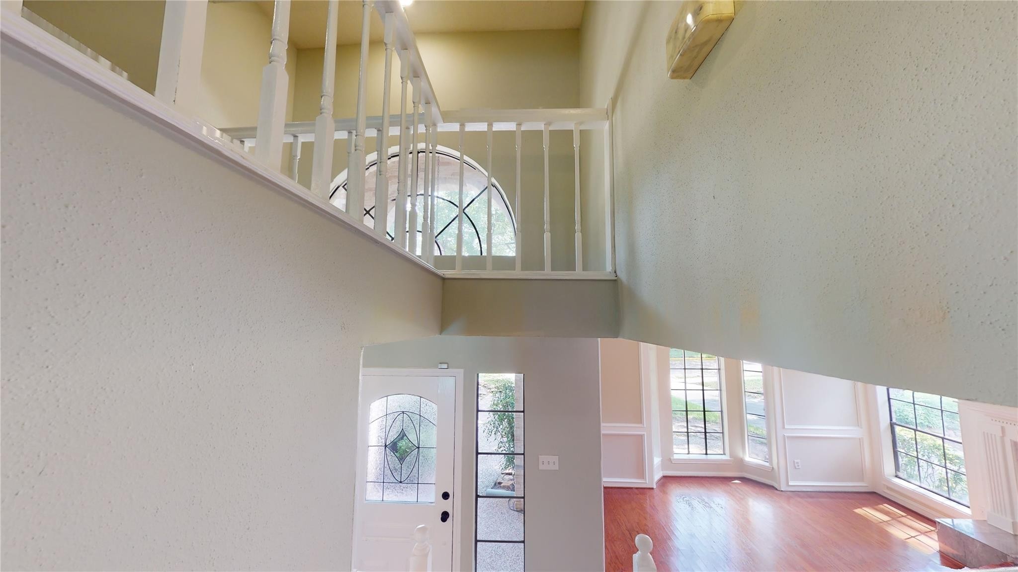 3510 Cypresswood Drive Spring, TX 77388 - Photo 14 of 36 a view of entryway and hall with wooden floor