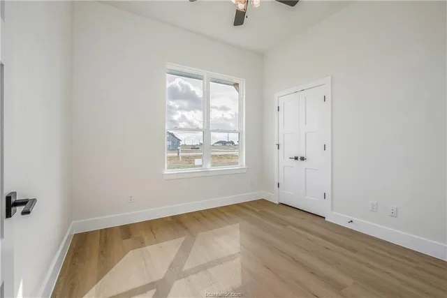 an empty room with windows