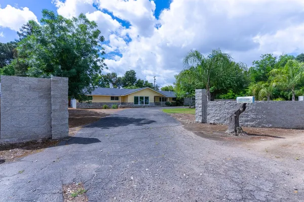 a view of backyard with outdoor space