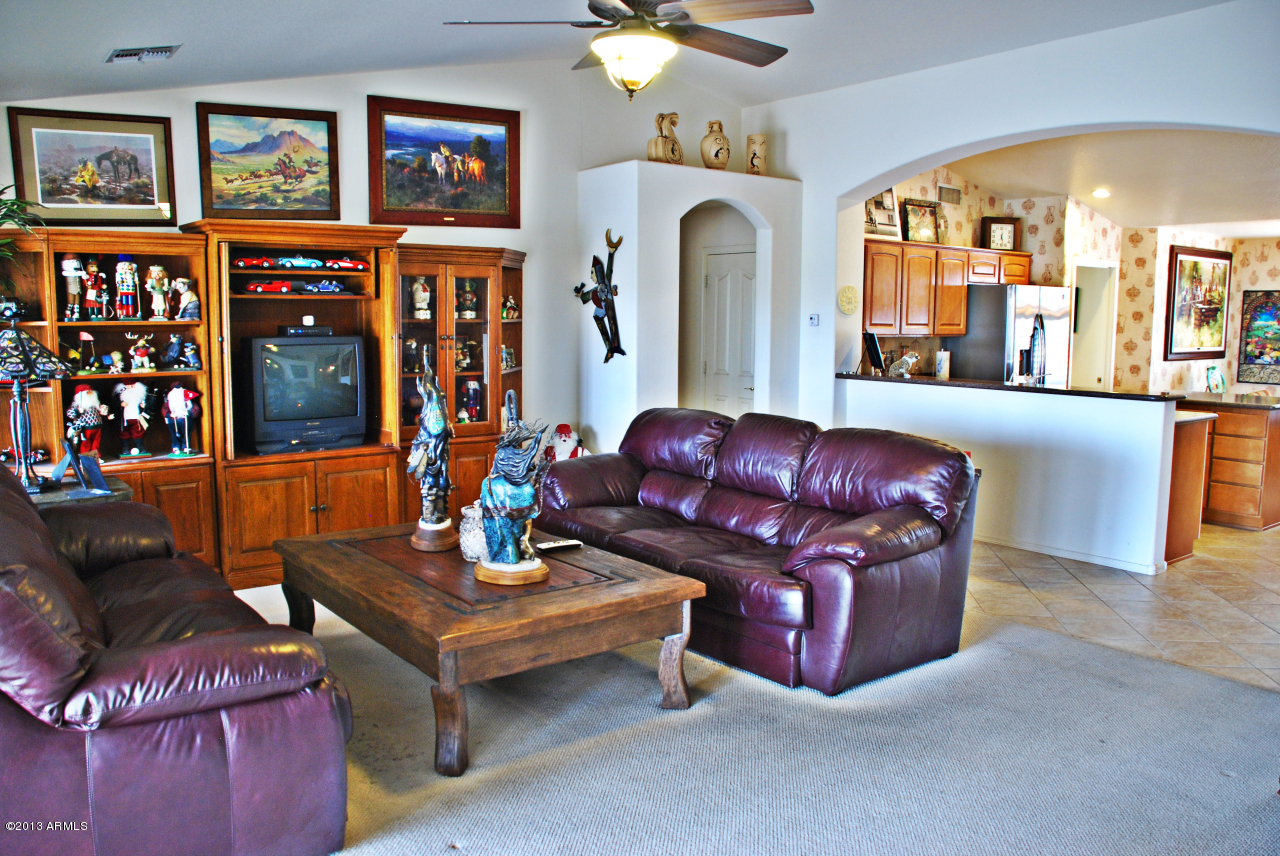 14765 Piccadilly Road Goodyear, AZ 85395 - Photo 3 of 16 Family Room and Kitchen