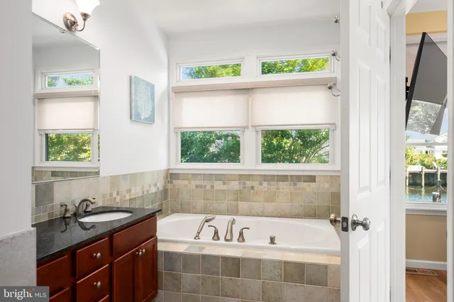 a view of entryway with wooden floor and stairs
