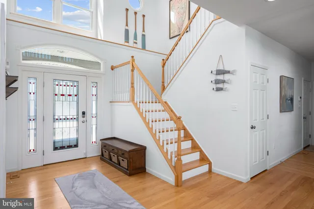 workspace with wooden floor windows and outdoor view