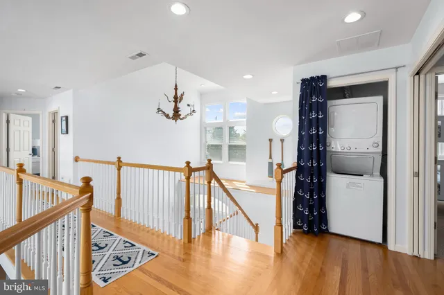 a view of a bedroom with furniture