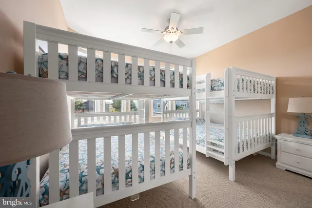 a bathroom with a sink toilet and a mirror