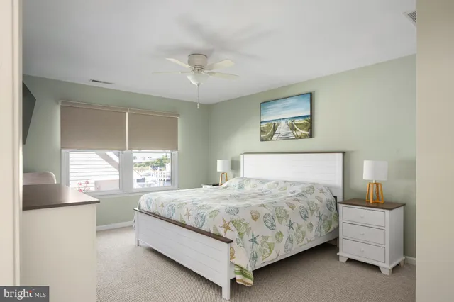 a view of a hallway with stairs